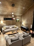 Enjoy the cosiness of the living room with the fireplace